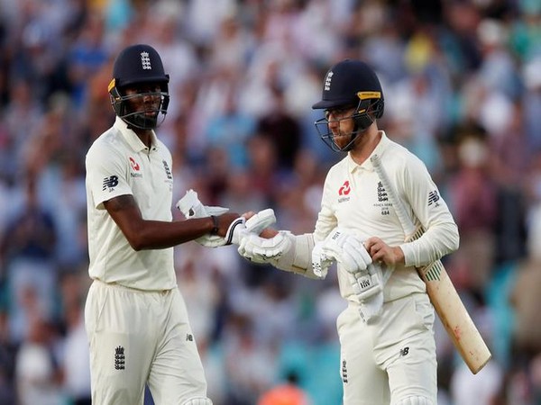 England's Jofra Archer and Jack Leach after close of play on day three 
