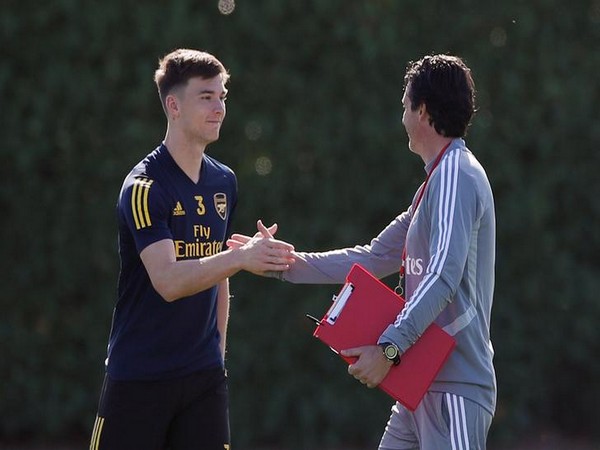 Arsenal manager Unai Emery and Kieran Tierney 