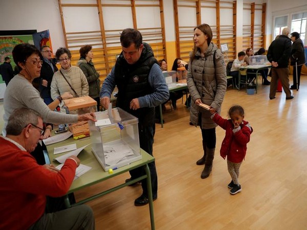 A man casts his vote during general election in Madrid on Sunday. Photo/Reuters