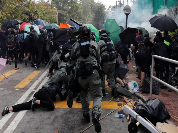 The financial hub of Asia is witnessing turmoil for another day after a man was shot at and another was set alight following a confrontation with protestors yesterday.