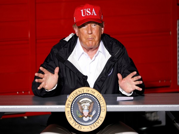 U.S. President Donald Trump gestures during a briefing at Lake Charles Fire House as he visits nearby areas damaged by Hurricane Laura in Lake Charles, Louisiana, U.S.