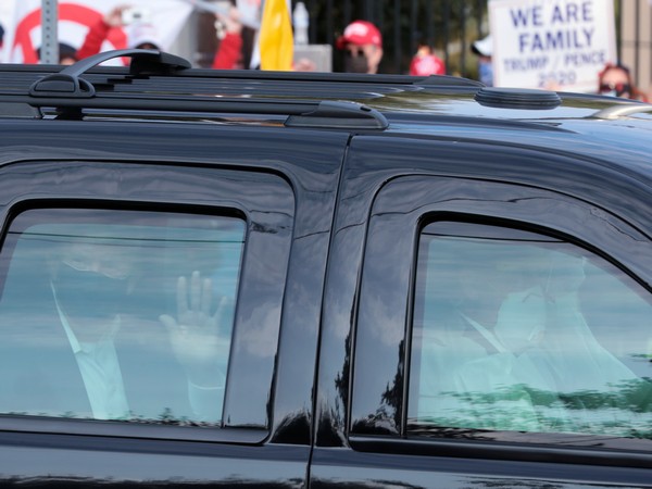    U.S. President Donald Trump rides in front a hospital in Bethesda, Maryland, US. (Photo credit: REUTERS)