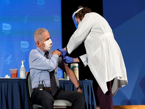 US top infectious disease specialist Dr Anthony Fauci receiving his first dose of Moderna coronavirus vaccine (Credit: Reuters Pictures)