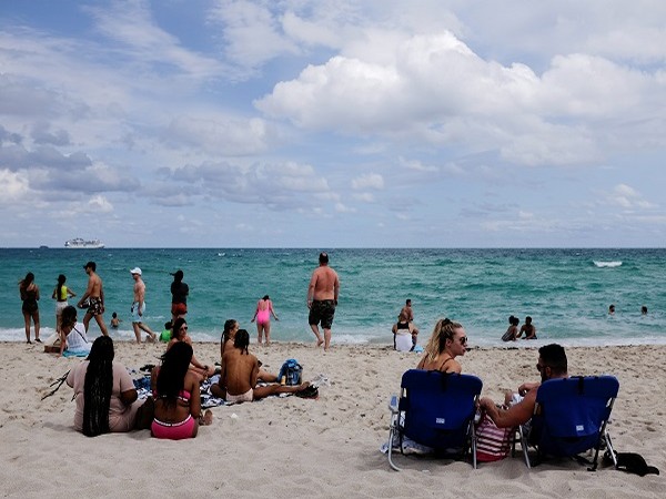 People flocking to Miami Beach (Credit: Reuters Pictures)