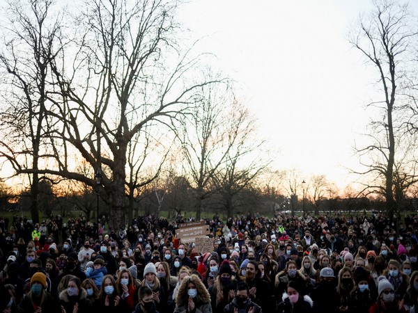 People gather at a memorial site in London following the kidnap and murder of Sarah Everard (Photo credit: Reuters)