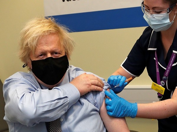 UK PM Boris Johnson taking first dose of COVID-19 vaccine (Credit: Reuters Pictures)