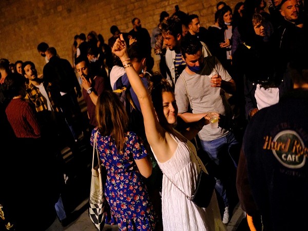 People partying in Spain as coronavirus curfew ends (Credit: Reuters Pictures)