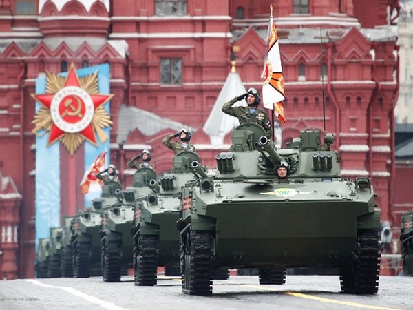 Russian service members drive BMD-4M infantry fighting vehicles during a military parade on Victory Day, in Red Square in central Moscow, Russia May 9, 2021. (Photo credit: REUTERS)