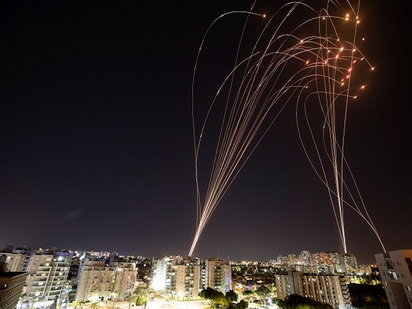 Streaks of light observed as rockets launched from Gaza towards Israel (Credit: Reuters Pictures)