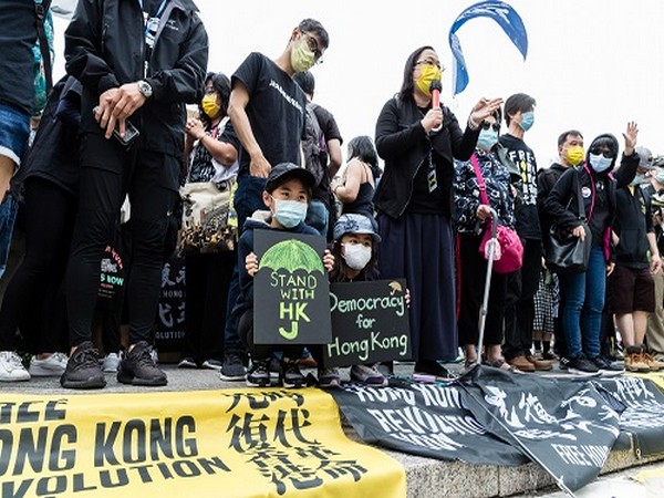    People gather for a rally to mark the second anniversary of the protests in Hong Kong, in Union Square in New York City, US, June 12, 2021. (Photo Credit: REUTERS)
