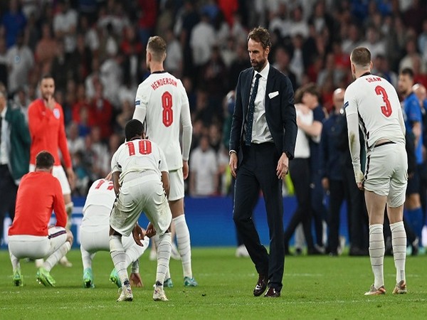 England players and coach at the Wembley Stadium.
