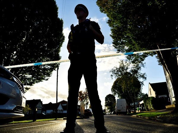 A police officer guards the scene where MP David Amess was stabbed during constituency surgery, in Leigh-on-Sea, Britain. (Photo Credit: REUTERS)