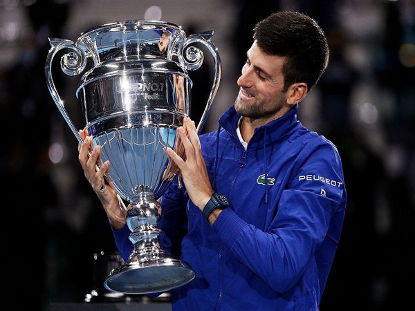 Novak Djokovic with year-end ATP Tour No. 1 trophy after win against Casper Ruud in ATP Finals