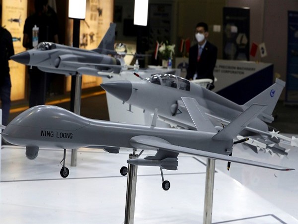 A model of the Wing Loong plane is displayed at the Chinese stand at Egypt Defence Expo (EDEX), showcasing military systems and hardware, in Egypt, November 30, 2021. (Photo Credit: REUTERS)