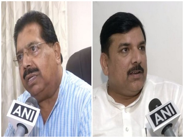 Congress leader PC Chacko and AAP leader Sanjay Singh talking to ANI in New Delhi on Monday. Photo/ANI