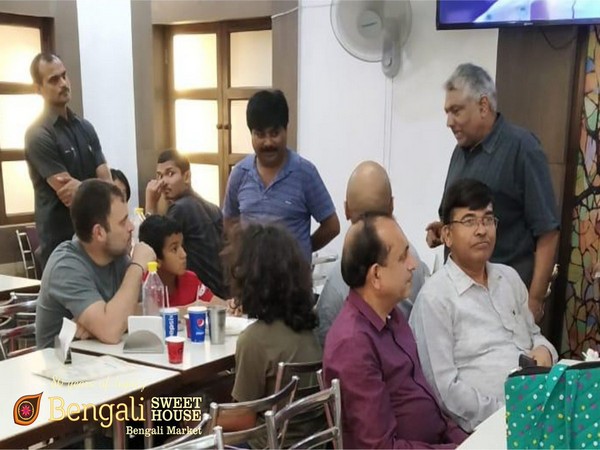 Congress leader Rahul Gandhi having lunch at Bengali Sweets House on Saturday. (Photo credits: Bengali Sweet House)