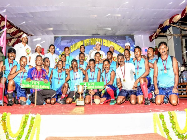 South Eastern Railway team with the trophy. Photo/ANI