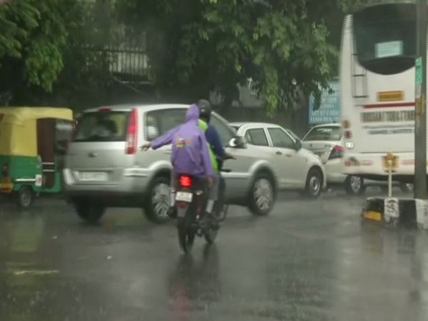 The capital witnessed heavy rainfall on Tuesday morning, bringing respite to people from the humid weather. Photo/ANI