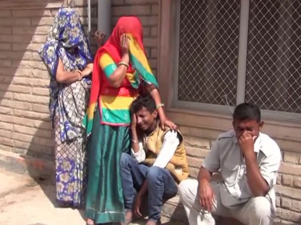 Family members of deceased at  Barmer on Thursday. (ANI/Photo)