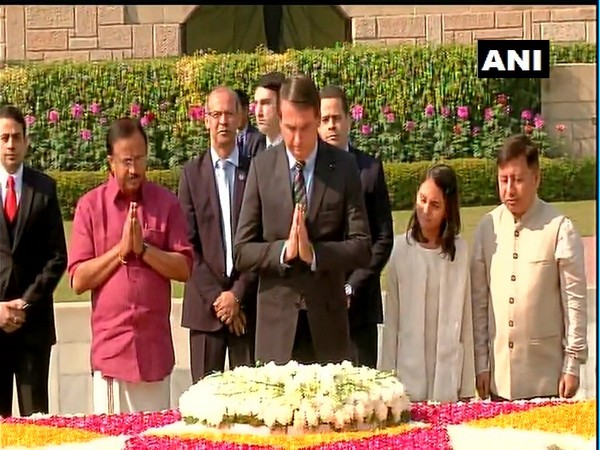 President of Brazil, Jair Messias Bolsonaro pays floral tribute to Mahatma Gandhi at Rajghat.
