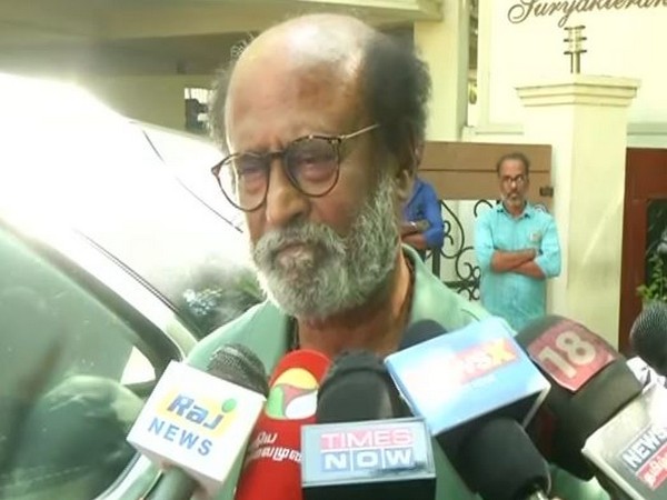 Actor-turned-politician Rajinikanth talking to reporters on CAA