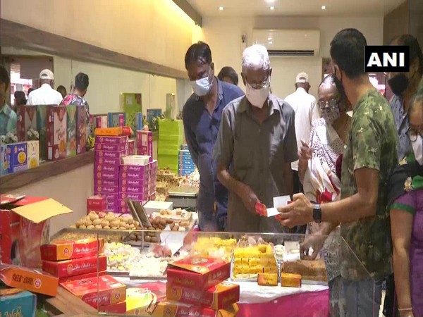 A sweet shop bustling with customers during Dussehra in Rajkot, Gujarat. (Photo/ANI)