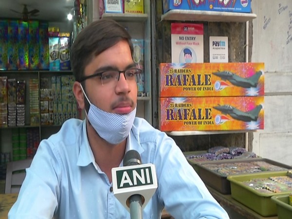 Firecracker merchant Aakash speaking to ANI in Rajkot on Monday. Photo/ANI