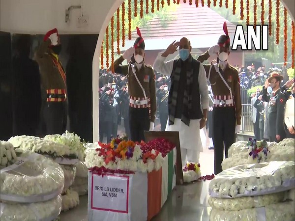 Defence Minister Rajnath Singh pays tribute to Brig LS Lidder at Brar Square, Delhi Cantt (Photo/ANI)