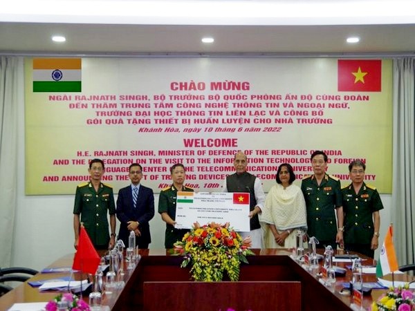 Defence Minister Rajnath Singh hands over Rs 5 mn for training aids to Telecommunication University in Nha Trang.(Photo/Twitter)