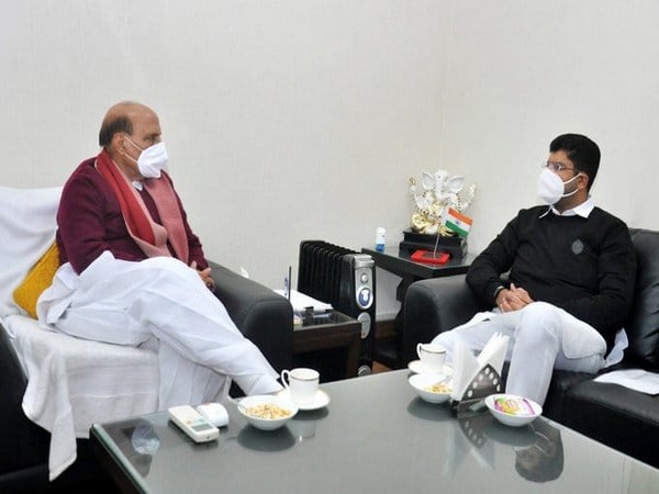 Haryana Deputy Chief Minister Dushyant Chautala meets Defence Minister Rajnath Singh on Saturday. Photo/ANI