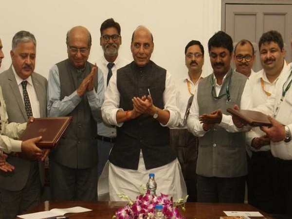 Defence Minister Rajnath Singh along with others during the signing of MoU in New Delhi on Thursday. Photo/ANI 