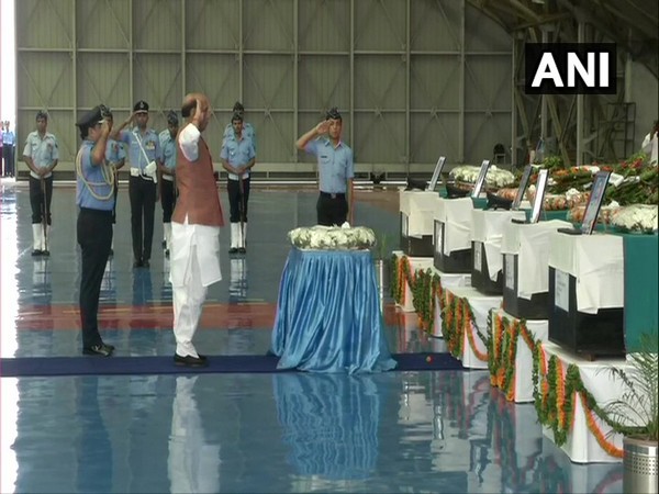 Union Defence Minister Rajnath Singh pays homage to 13 IAF personnel killed in An-32 crash at Palam Airport, Delhi