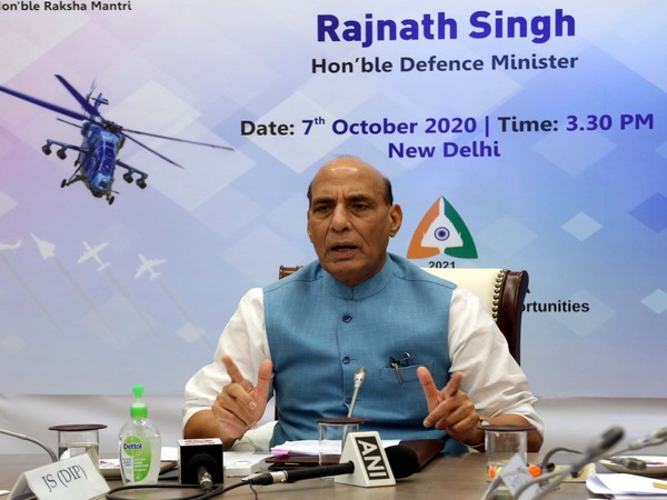 Defence Minister Rajnath Singh speaking at the Aero India show on Wednesday. (Image Source: Twitter handle @DefenceMinIndia)