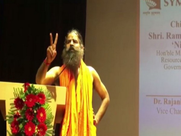 Yoga Guru Ramdev speaking at an event in Noida, Uttar Pradesh on Tuesday. Photo/ANI