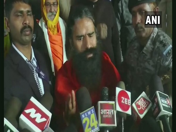 Yoga Guru Ramdev speaking to reporters in Deoria, Uttar Pradesh on Monday Photo/ANI