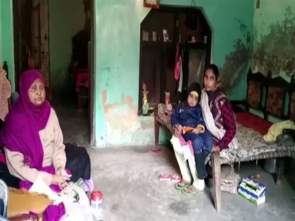 Family members of a person issued notice by the administration for vandalism in Rampur. Photo/ANI