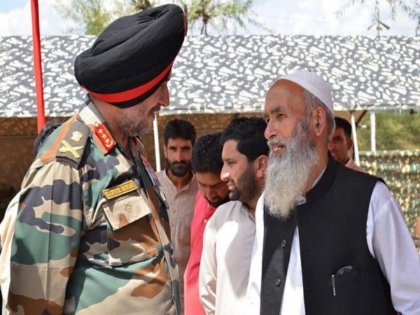 Northern Army Commander Lieutenant General Ranbir Singh interacting with locals on Wednesday. Photo/ANI