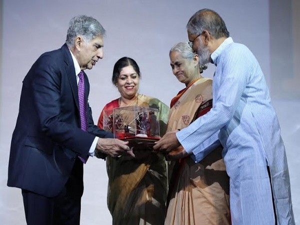 Dr Rani Bang and Dr Abhay Bang receiving the JRD Tata Award for Excellence in Public Service from Chairman Tata Group, Ratan Tata, Executive Director of Population Foundation of India Poonam Muttreja