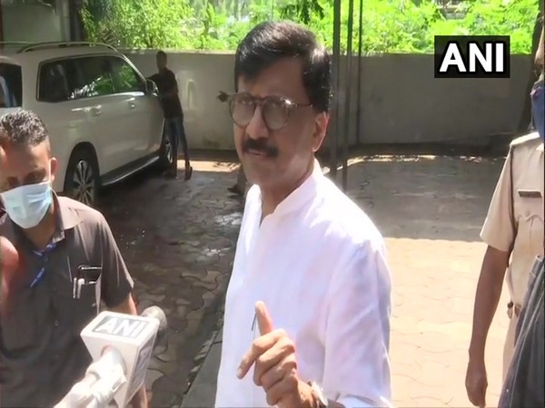 Shiv Sena MP Sanjay Raut speaking to reporters on Sunday. (Photo/ANI)