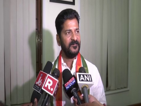 Telangana Congress MP Revanth Reddy speaking to reporters in Hyderabad on Thursday. Photo/ANI
