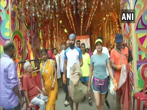 India's first 'plogger', Ripu Daman Bevli,reached Kolkata on Tuesday under his mission, 'Run To Make India Litter Free [Photo/ANI]