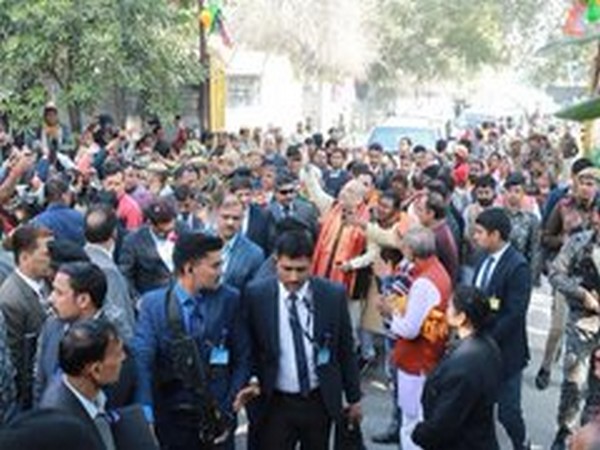 Union Home Minister Amit Shah at the roadshow in Seemapuri on Thursday. Photo/Twitter(Amit Shah)