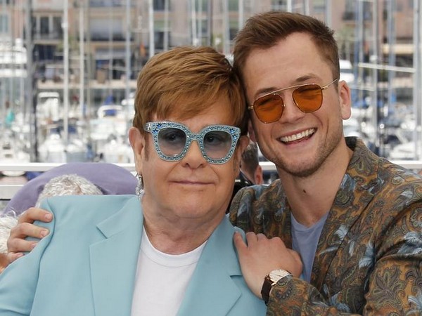 Elton John and Taron Egerton pose during 72nd Cannes Film Festival