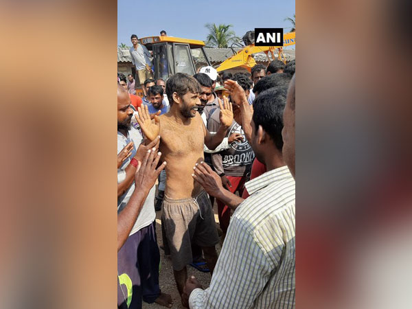 Rohith, the man who fell into a 15-feet deep hole in Udupi district was rescued on Sunday. Photo/ANI