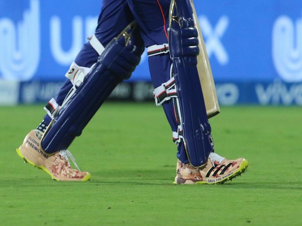 Rohit Sharma wearing the shoes with 
