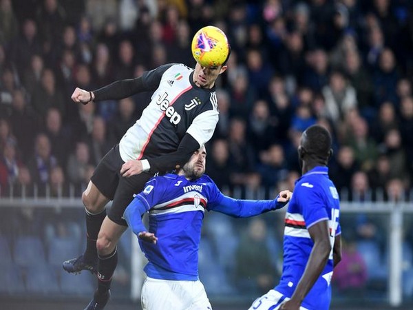 Christiano Ronaldo attempting a header during a game.