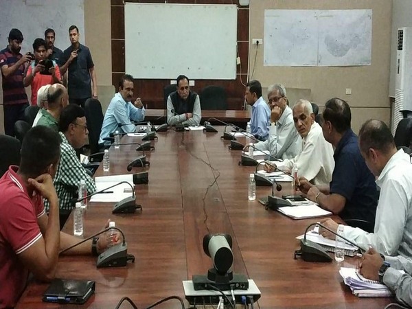 Gujarat Chief Minister Vijay Rupani holding a high-level meeting to review flood-like situation in Vadodara. (Photo/ANI)