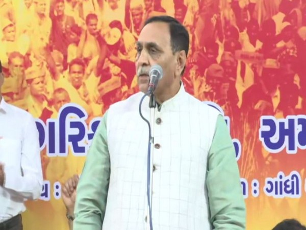 Gujarat CM Vijay Rupani speaking at a public rally in Ahmedabad on Tuesday. Photo/ANI