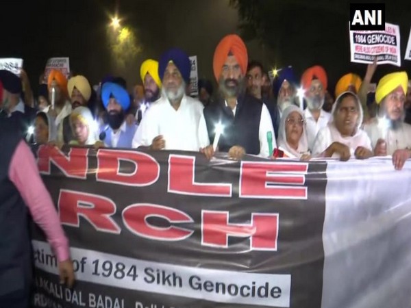 SAD chief Sukhbir Singh at the candle march in Delhi on Friday. Photo/ANI