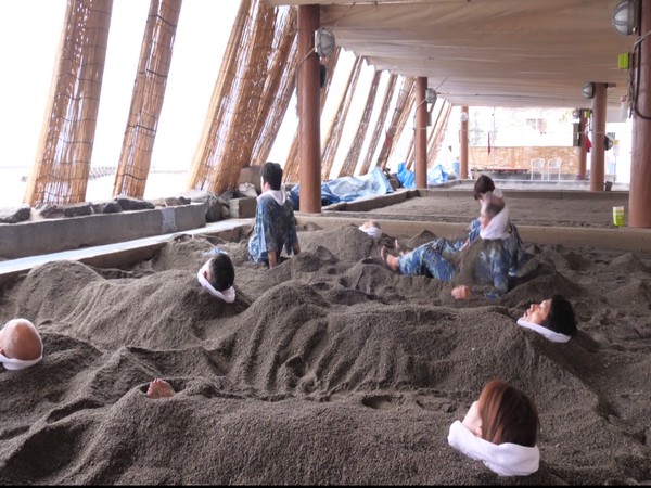 People enjoying hot sand bath in Japan (ANI)